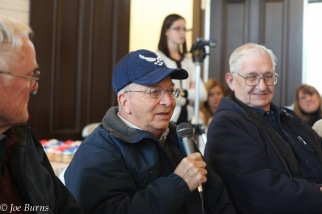 man in cap with microphone