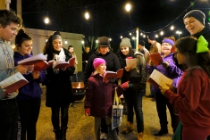 Country Bible carolers entertained families waiting for hay rack rides in the Butches Deli parking lot.